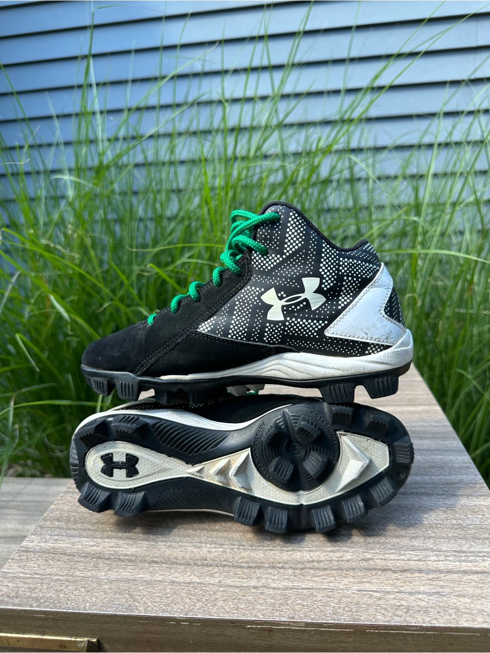 Under Armour Black Cleats with White Accents and Green Laces
